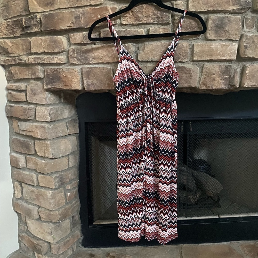 NWT Red, Black, and White Chevron pattern straps are adjustable M/L